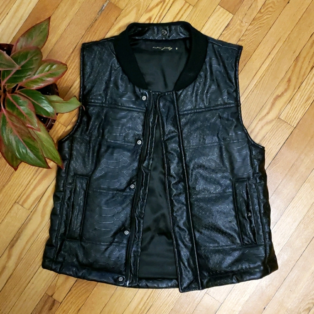 Sleek black pleather vest with snakeskin-like patt